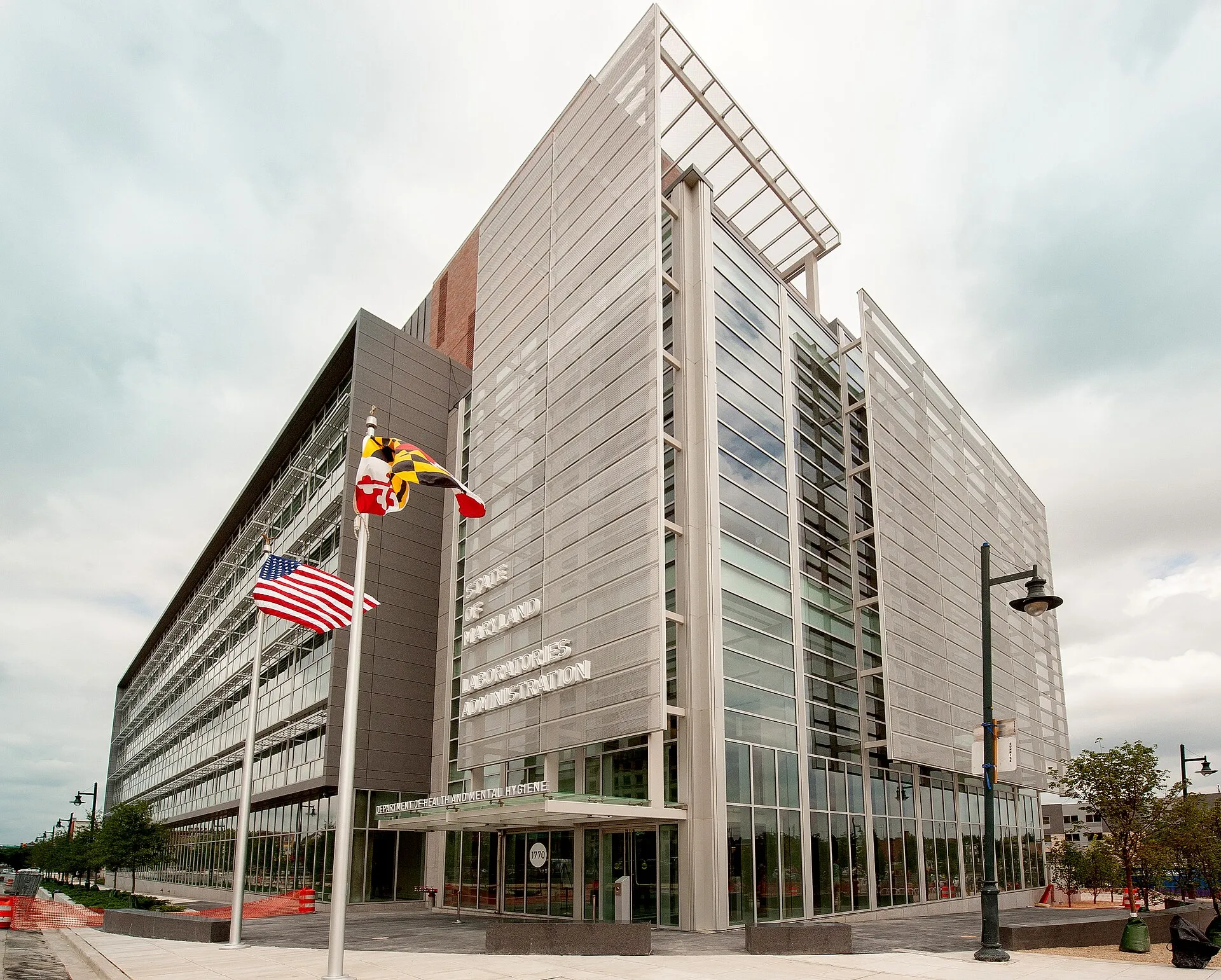 A $112 Million Epidemiology Contract in Limbo — and the Costs Nobody Budgeted For Exterior of a state public health laboratory building